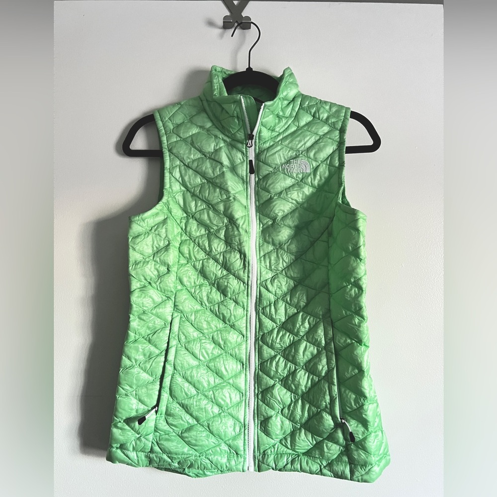 Lightweight The North Face front-zip vest.